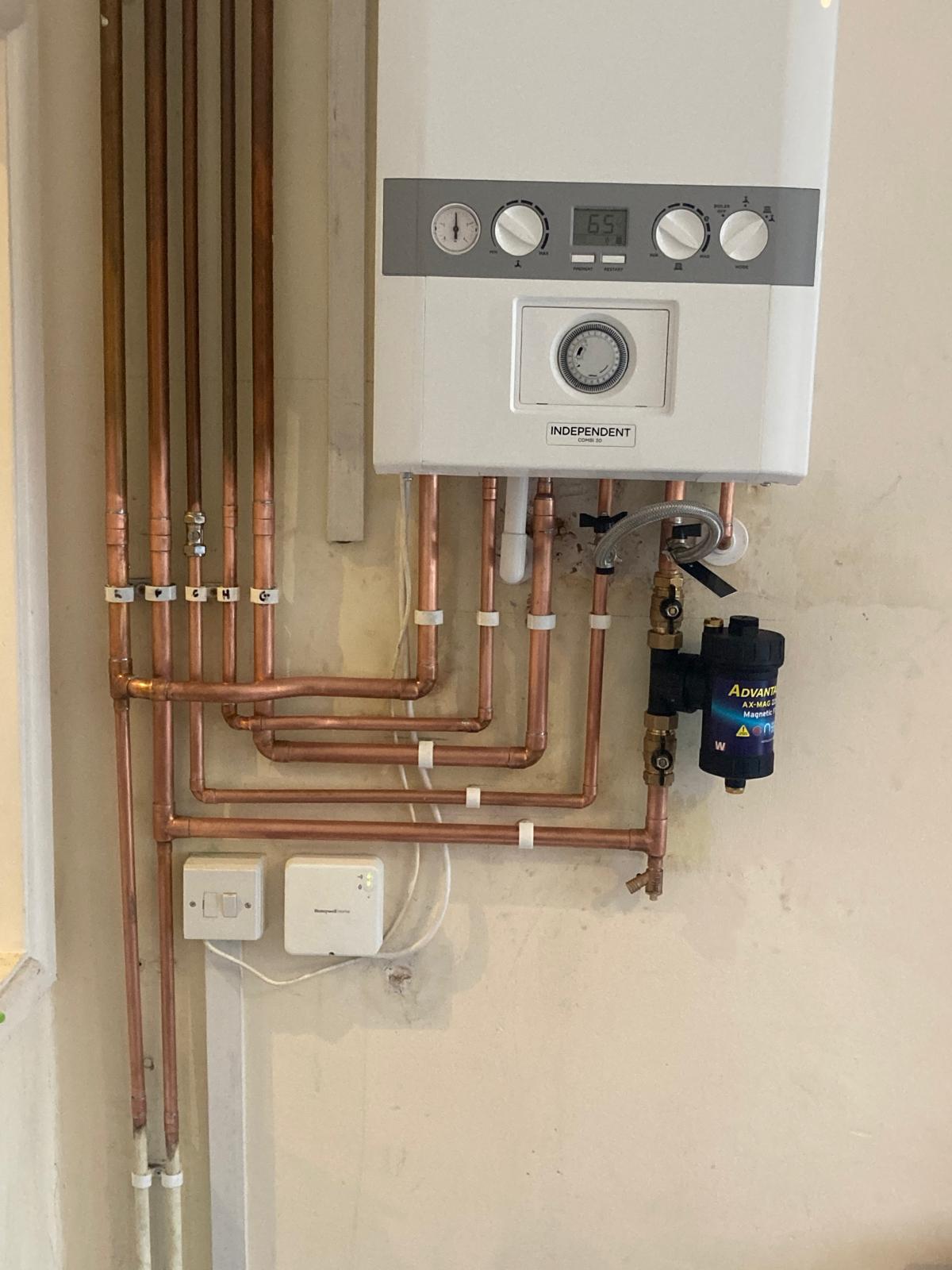 Boiler installation with copper pipework and a magnetic filter
